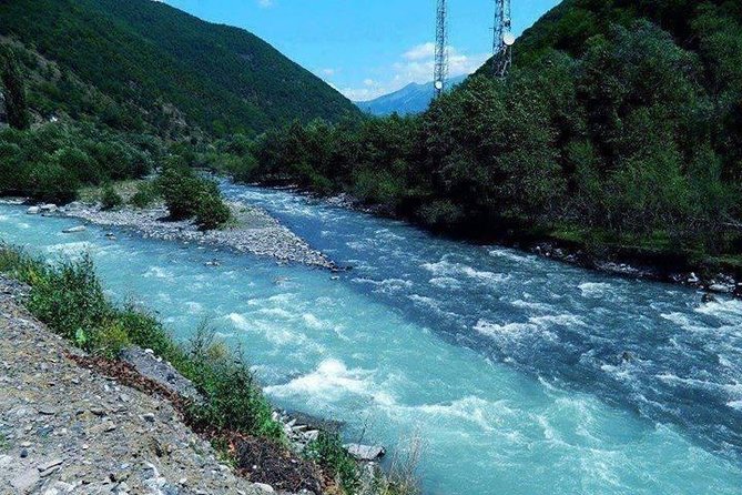 Ananuri, Gudauri, Kazbegi. Military Road of Georgia. Private tour. - Zhinvali Reservoir: turquoise water at the first stop