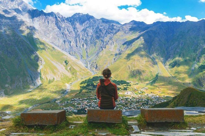 Bestseller Day Trip to Kazbeg/Gergeti Delicious Lunch at Rooms - The Friendship Monument and its wide mountain view