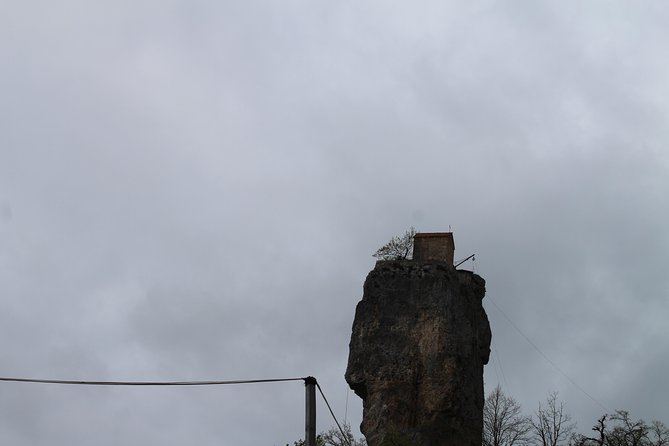 Chiatura. Soviet Past in the present. + Katskhi pillar - Mgvimevi Monastery and its stone passage