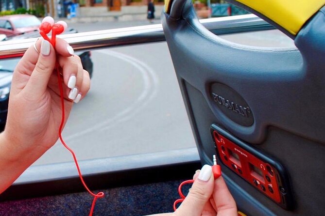 City tour Tbilisi on red bus - Headsets, languages, and the level of guidance