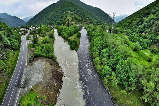 Day tour to mountains Jinvali lake, Ananuri, Kazbegi, Arch friendship - Gergeti Trinity Church and the 4X4 question