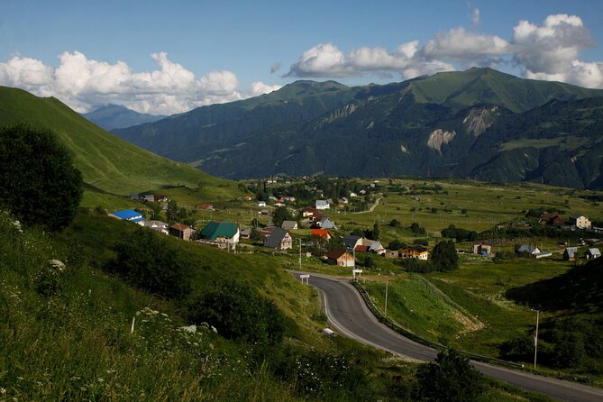 Jvari Monastery, Ananuri, Gudauri, Kazbegi Group & Private Tour - Gudauri Friendship Monument and the 600-meter drop