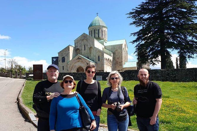 Kutaisi Walking Tour - Crossing the chain bridge toward the river
