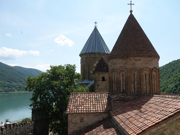 Military Road Marvels: Ananuri, Kazbegi & Khinkali Masterclass - Ananuri Castle, stone walls above the reservoir