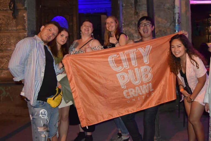Tbilisi: City Pub Crawl with welcome shots in game format - Walking through Sololaki between stops