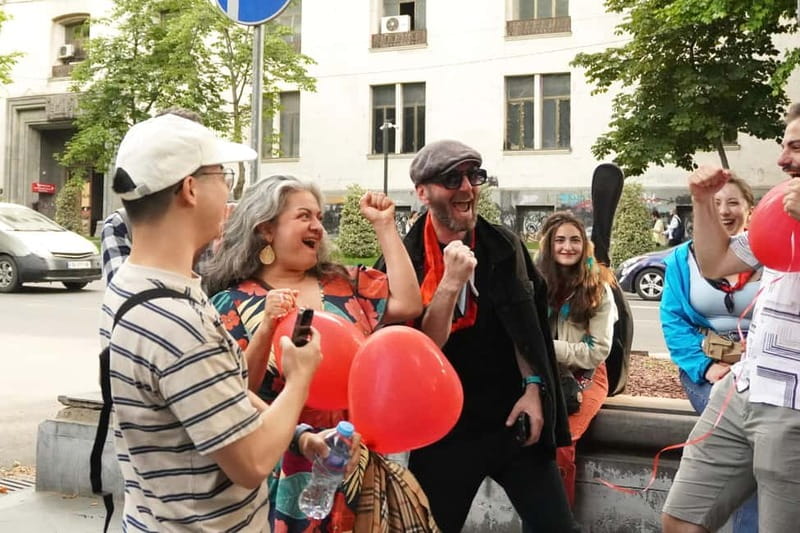 Tbilisi: Evening Walking Tour with Wine & Boat Ride Options - Rustaveli Avenue and Georgia’s public face