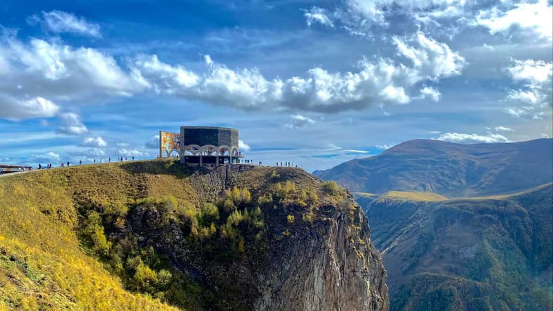 Tbilisi: Gudauri and Kazbegi Day Trip Including 4WD - Gudauri adds honey, snow, and a famous monument