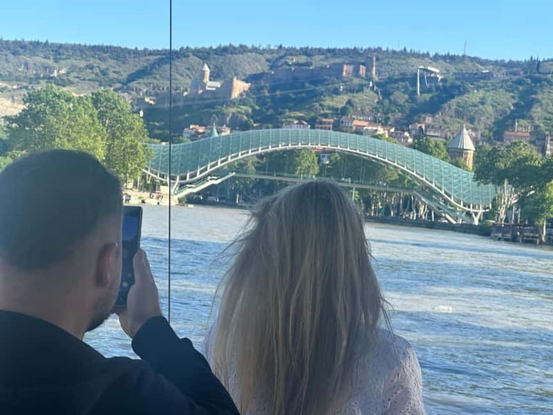 Tbilisi: River Sightseeing Boat Ride with Welcome Drink - What the boat ride adds to a first day in Tbilisi