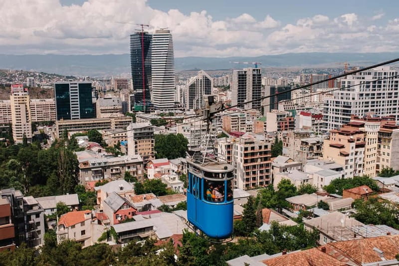 Tbilisi: Streets, Stories, Flavors - A Signature City Tour - Coffee, sweets, and the first look at modern Tbilisi