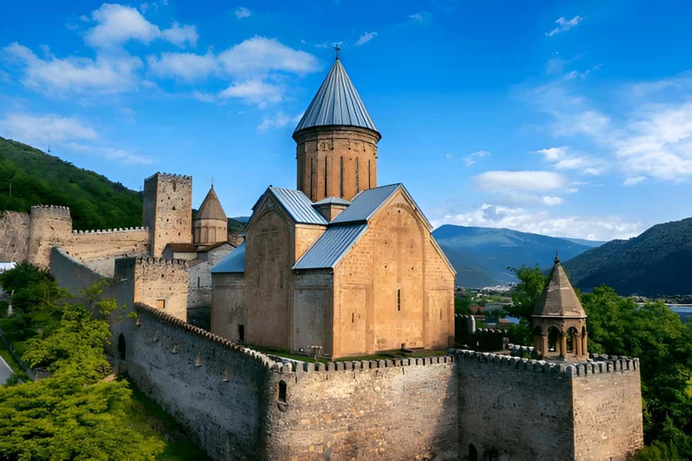 Tbilisi to Kazbegi Gudauri Ananuri Zhinvali Group GuidedTour - Pasanauri is the practical lunch and tasting stop