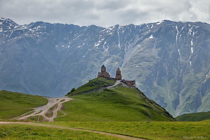 To The Majestic Kazbegi Full Day tour - Zhinvali Reservoir, blue water below the mountains