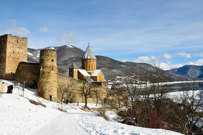 Tour to Kazbegi Ananuri Zhinvali Gudauri Full Day - Ananuri Fortress and its carved churches